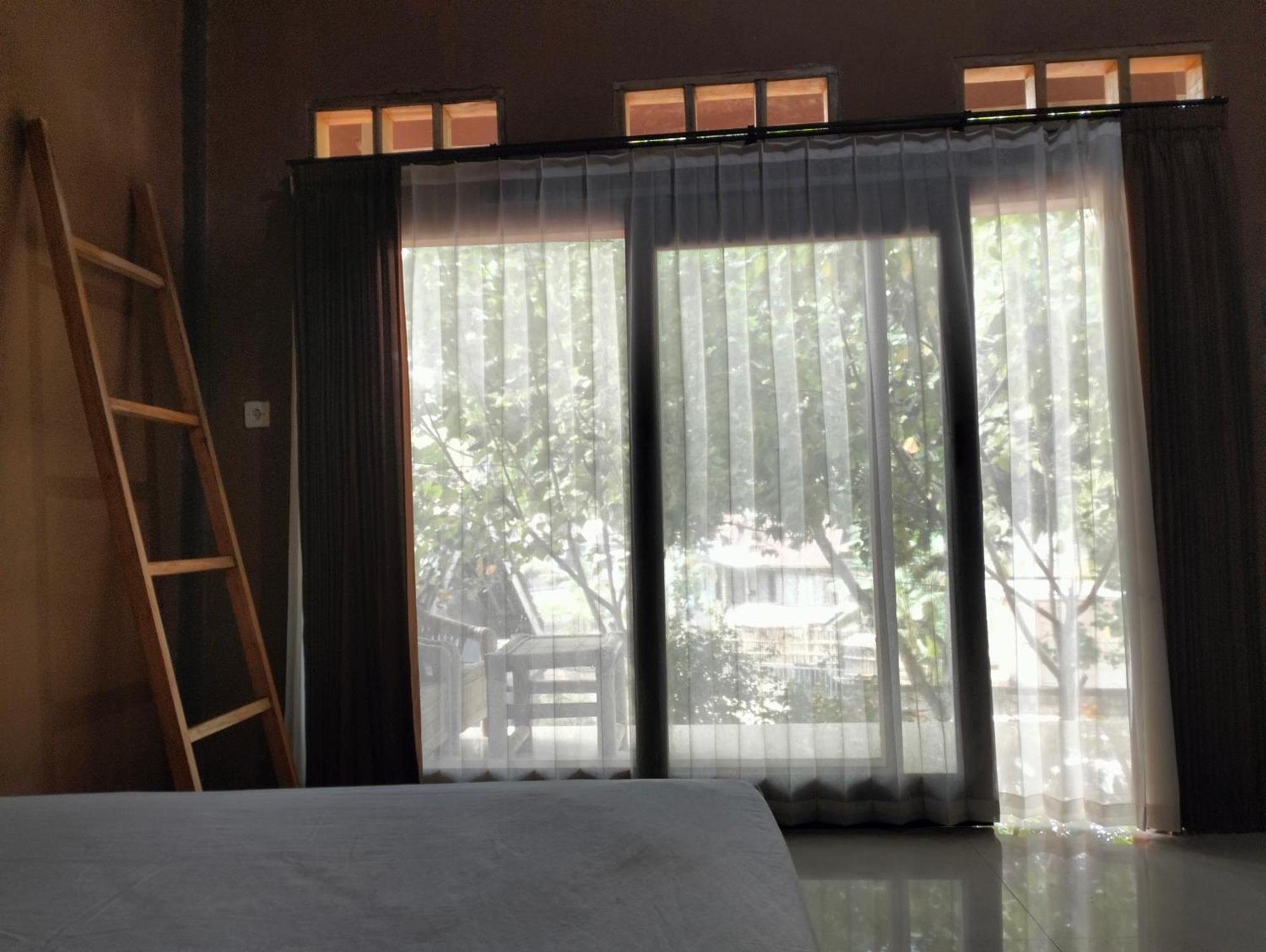 Fullmoon Homestay Kuta  Экстерьер фото