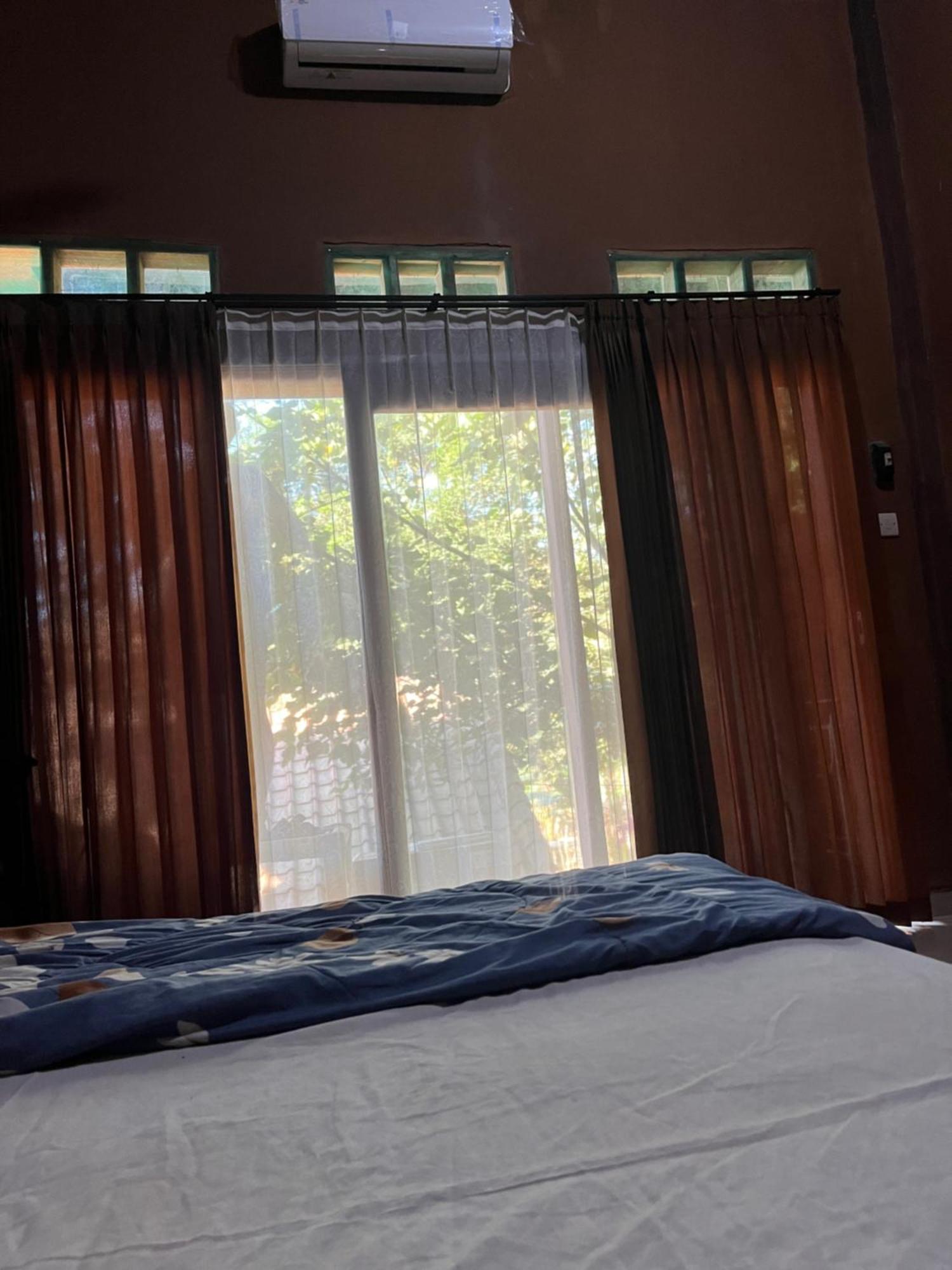 Fullmoon Homestay Kuta  Экстерьер фото